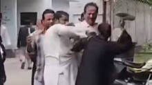woman-beats-husband-with-